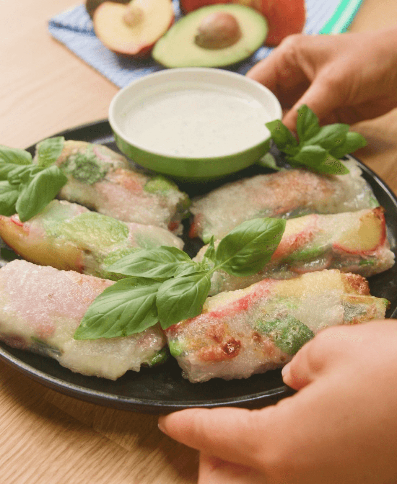 crispy peach prosciutto summer roll hero image