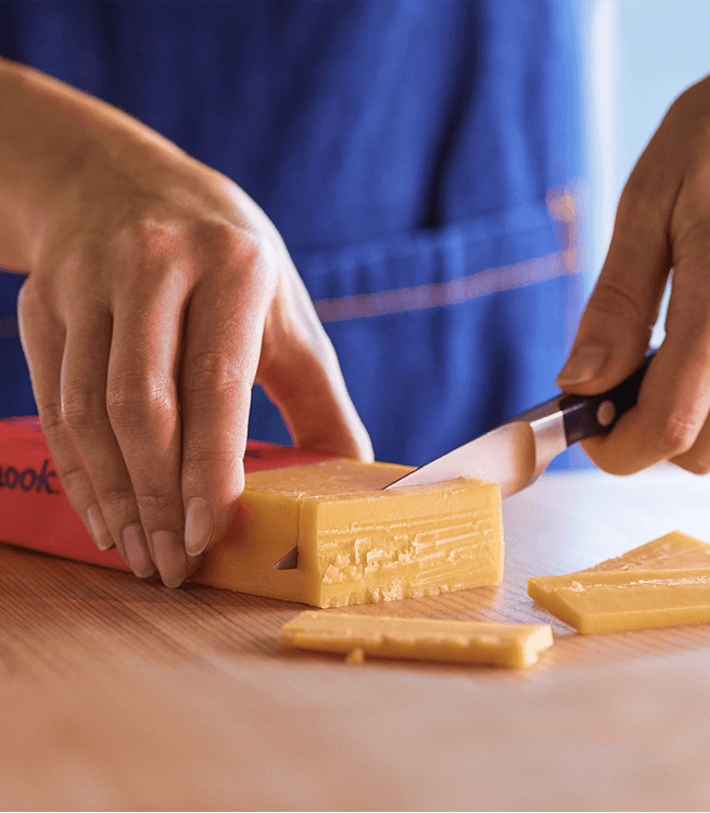 Cheese Block being cut