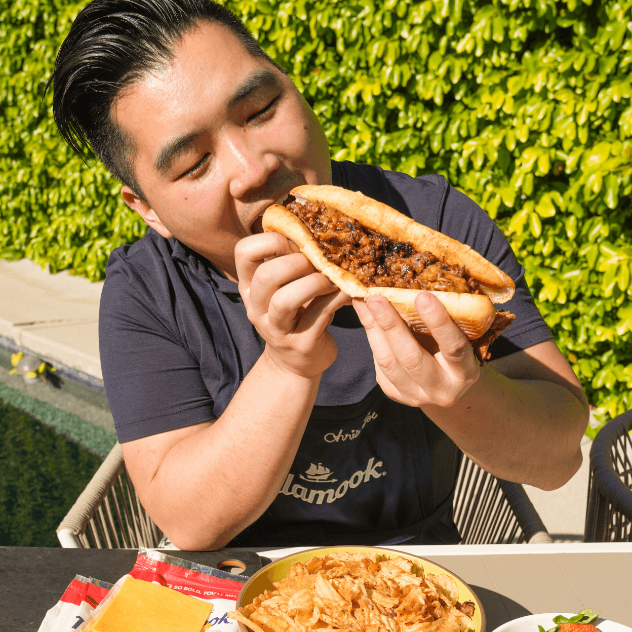 Chris Joe eating Bulgogi Cheesesteak